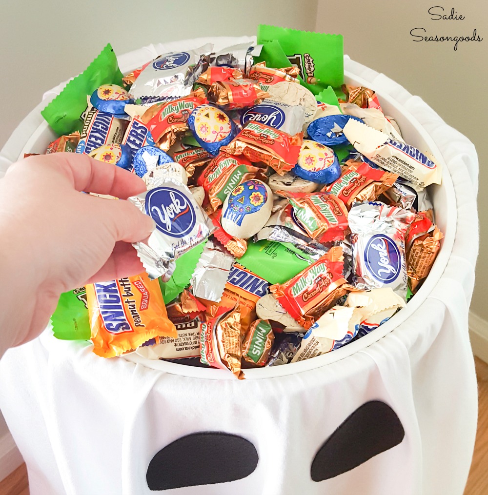 Social distanced Halloween with a candy bowl stand for the front porch