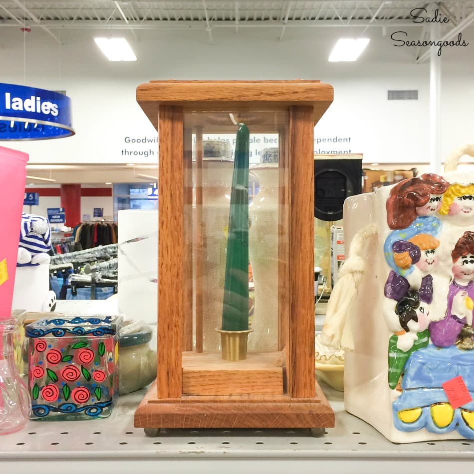 Wooden hurricane lantern at thrift store