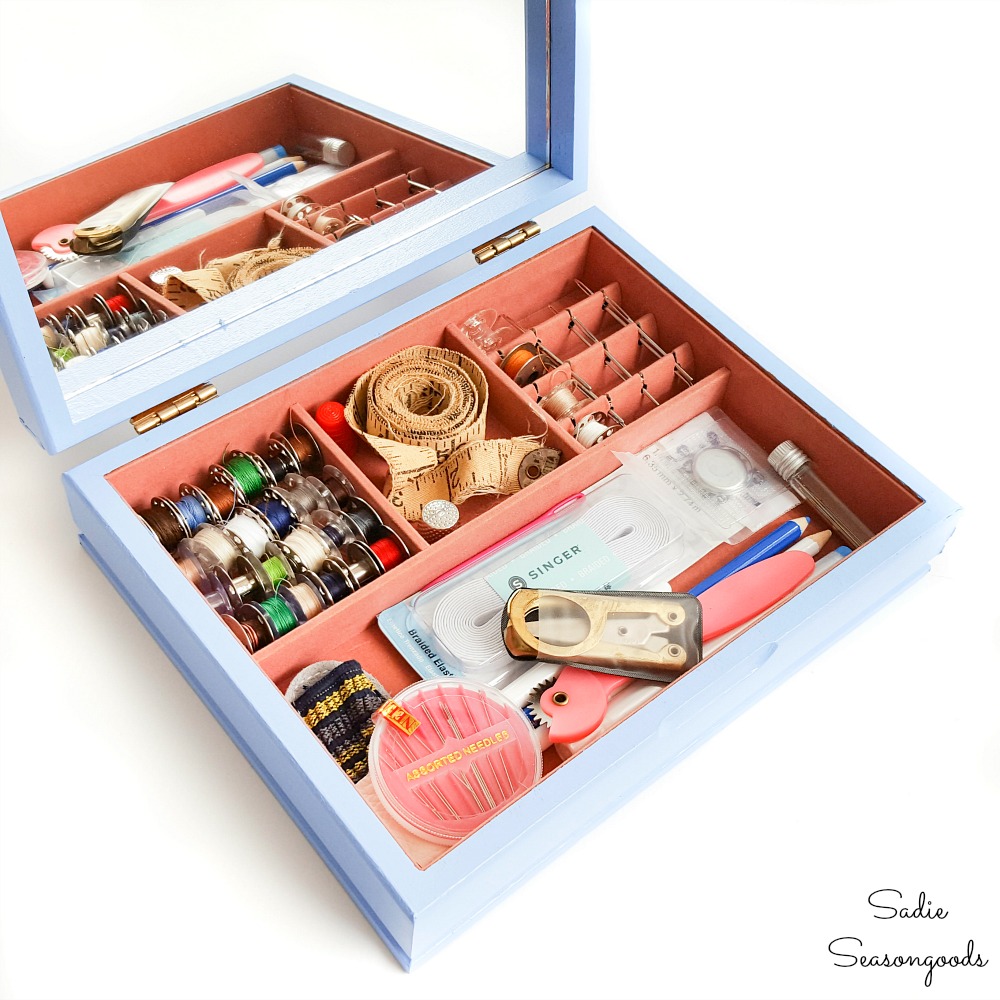 Sewing supplies in a vintage jewelry box for storage