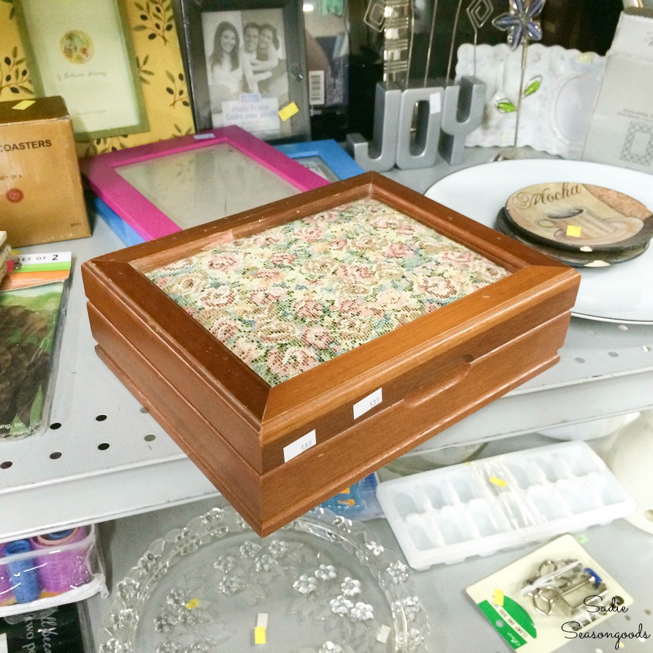 Vintage jewelry box with a tapestry cushion lid