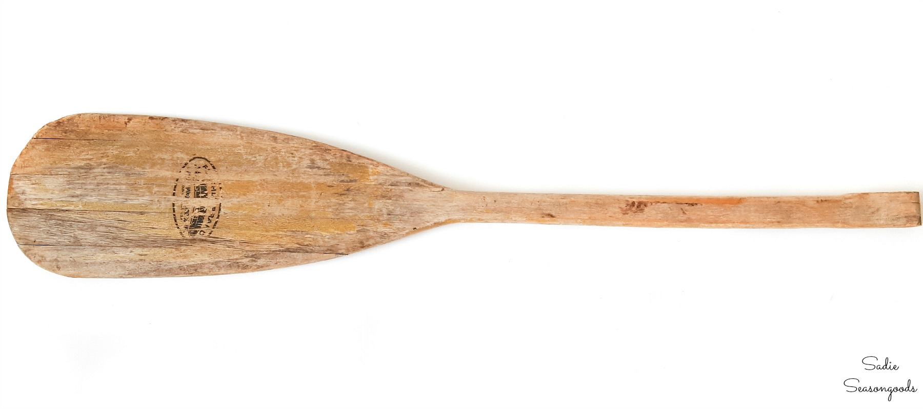Boat oar or wood paddle that is cracked and needs a makeover