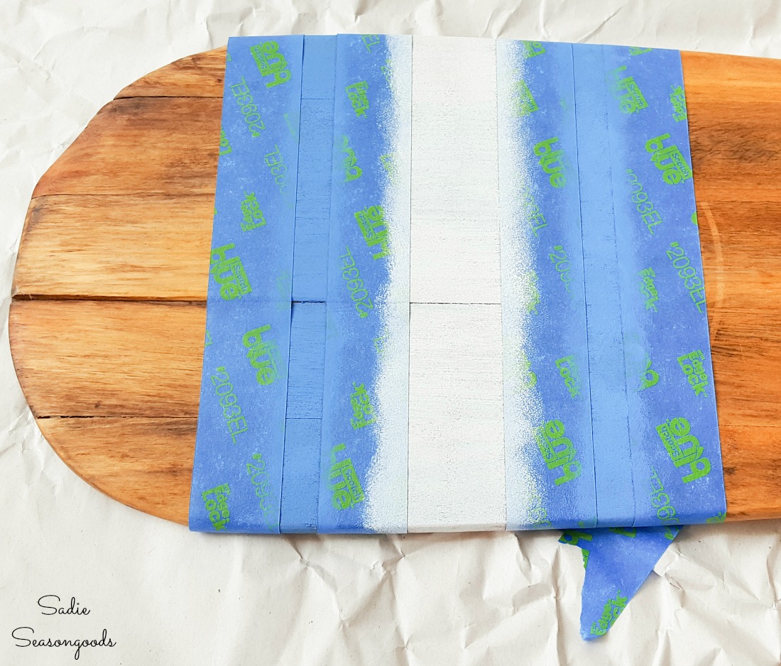 Decorating a wood paddle with nautical stripes