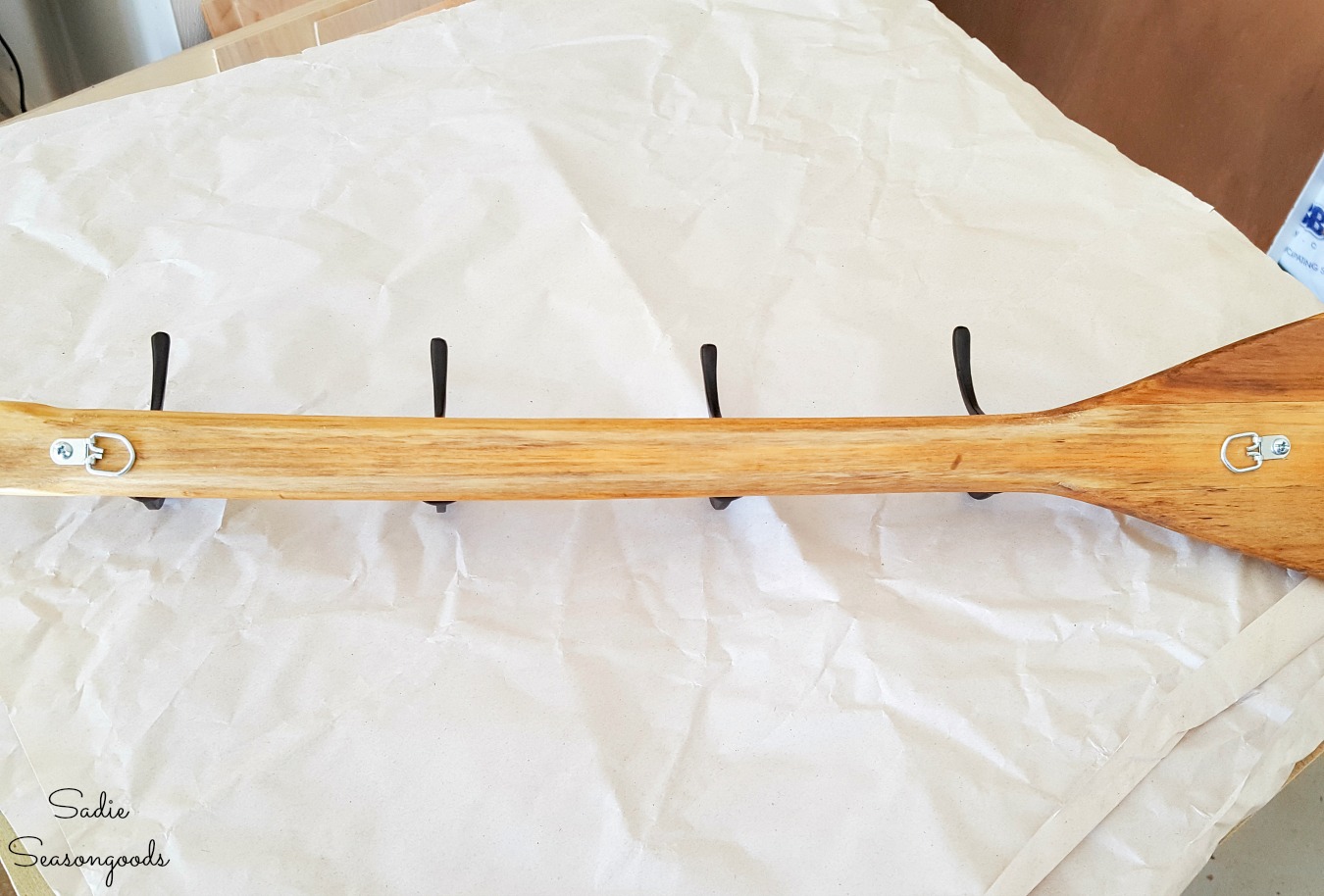 Making a DIY rustic coat rack from a wooden paddle