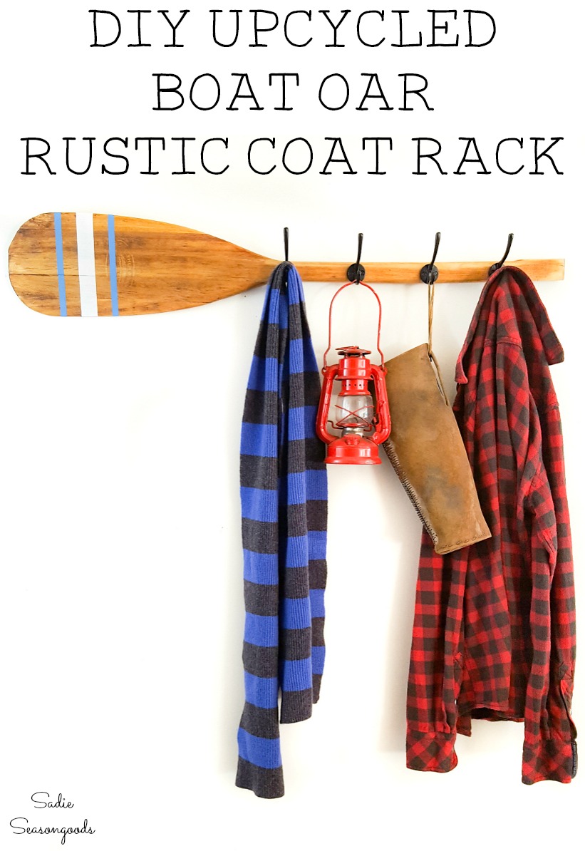 Nautical coat rack with a row boat oar or wood paddle
