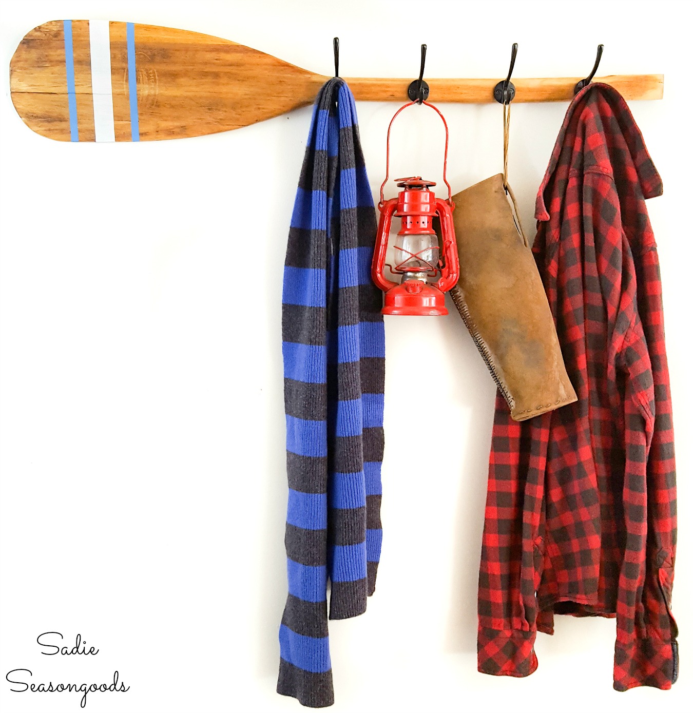 Repurposing a wood paddle as wooden oar decor and rustic coat rack