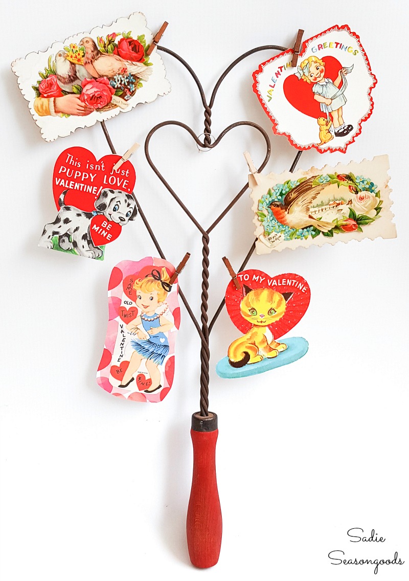 Vintage Valentine Decorations On An Antique Rug Beater