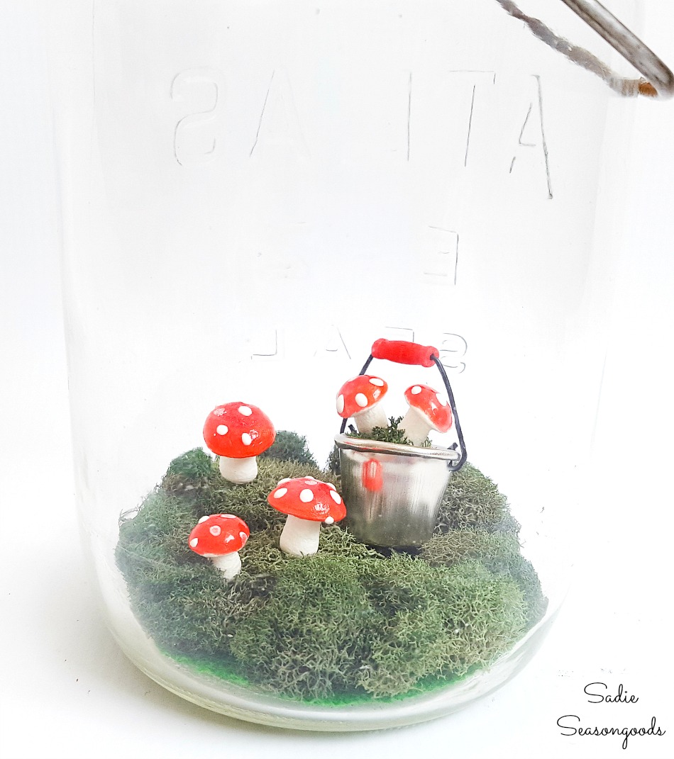 Decorating ideas for Spring with fairy garden accessories and vintage glass jars