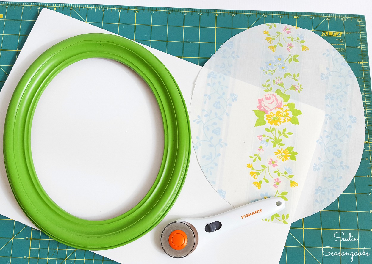 Filling a vintage oval frame with floral fabric to look like the unusual Easter eggs
