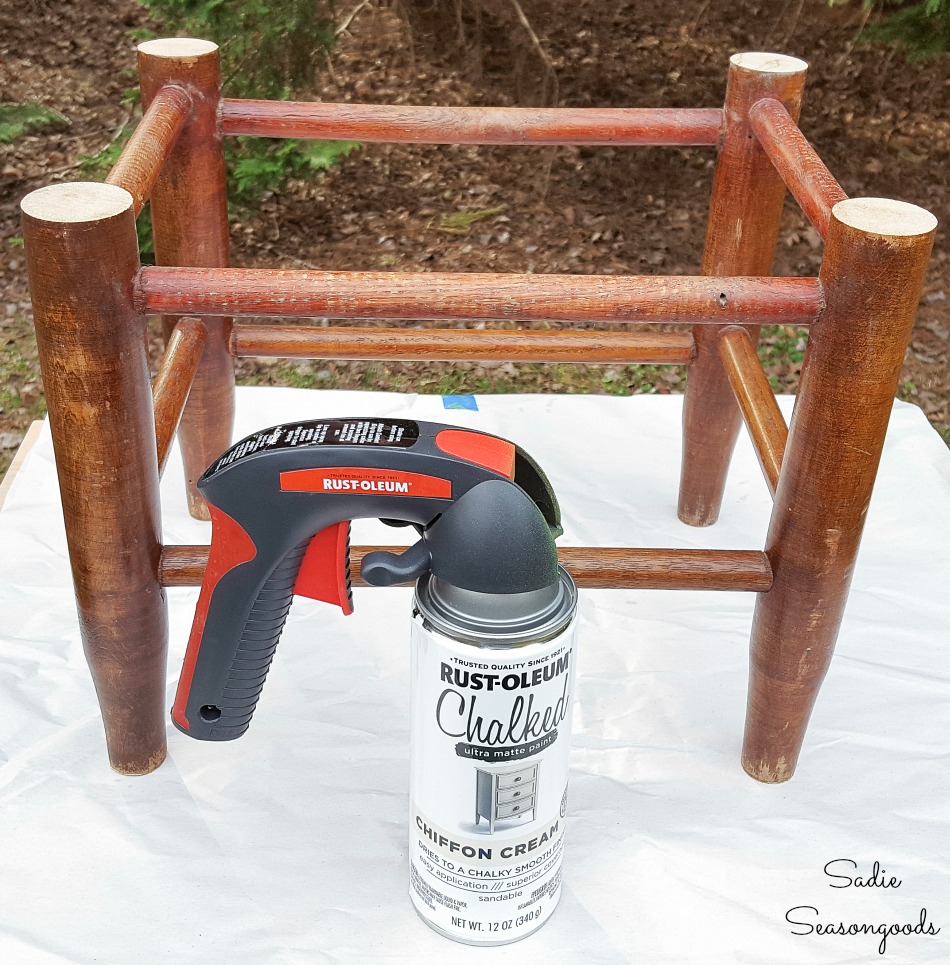 Upcycling a wooden footstool into a farmhouse footstool with chalked spray paint