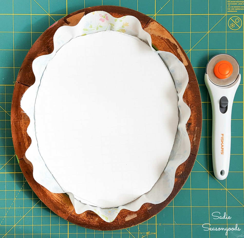 Upcycling an oval frame into Easter mantel decorations like the Pysanky eggs