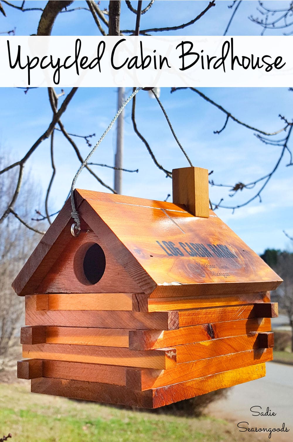 Vintage coin bank as a log cabin bird house