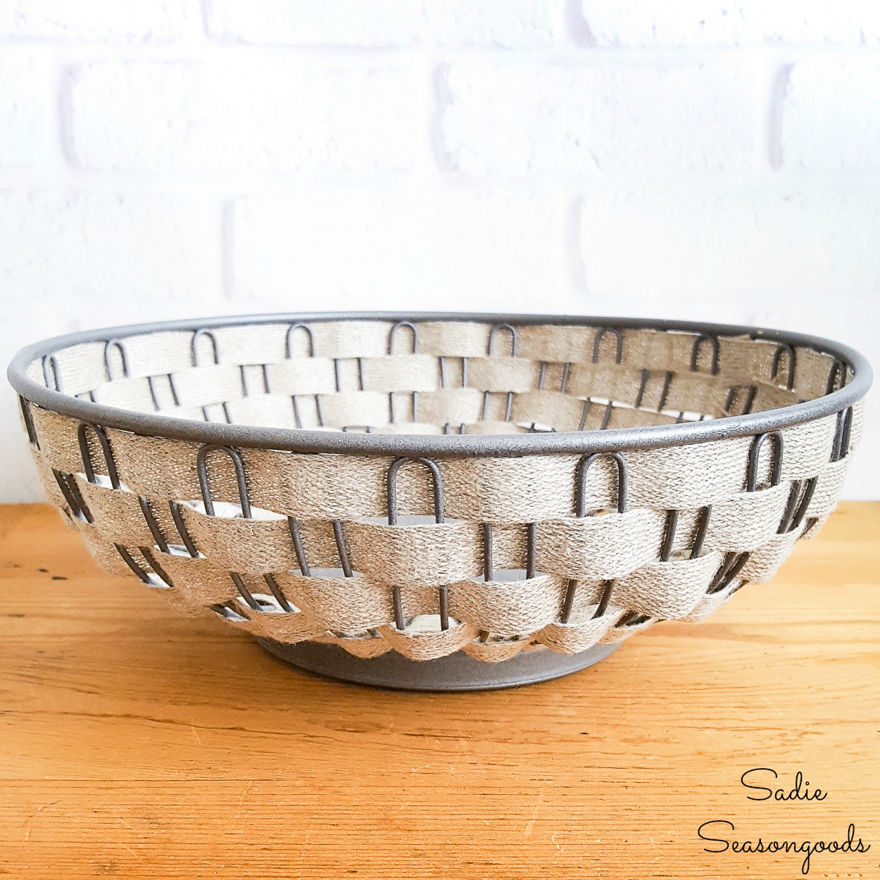 Vintage farmhouse decor with a wire bread basket and galvanized spray paint