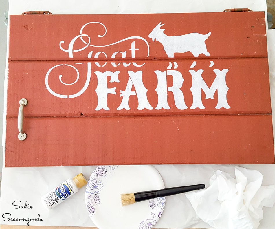 stenciling a farm sign