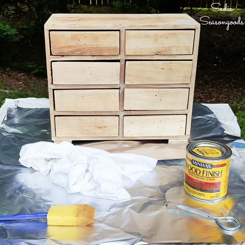 Honey wood stain on a DIY card catalog from a mini chest of drawers