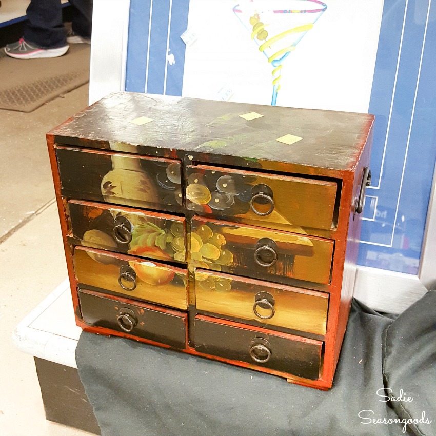 Mini chest of drawers at a thrift store for upcycling into a vintage library card catalog