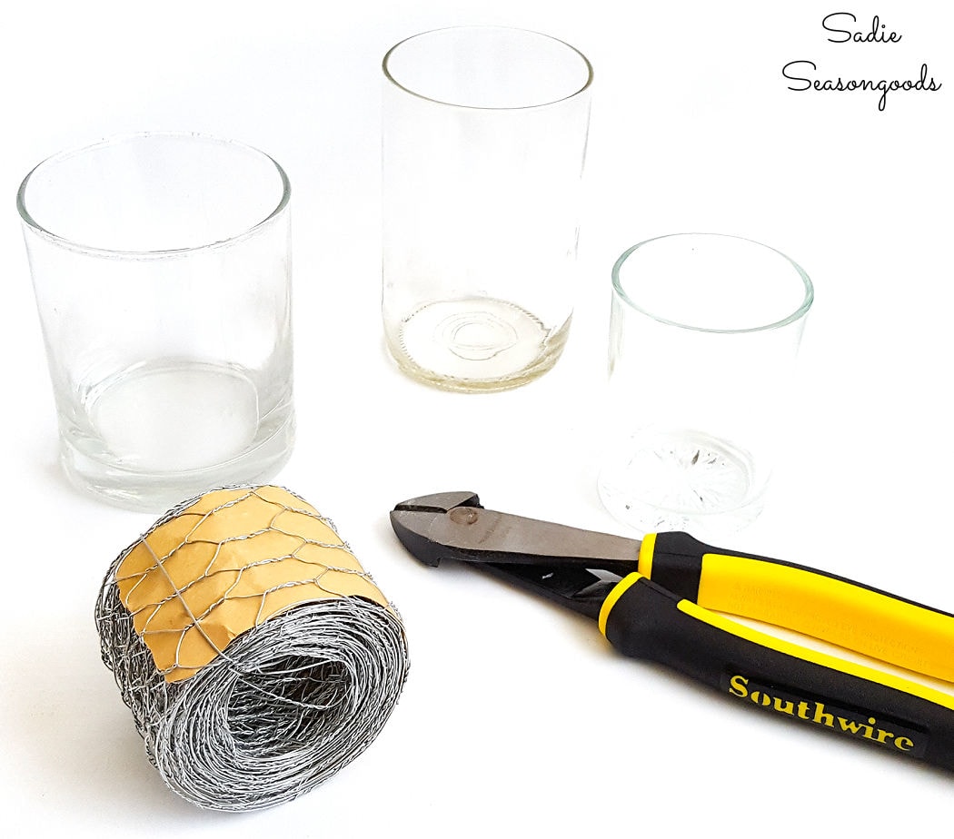 wrapping the candle holders with chicken wire ribbon