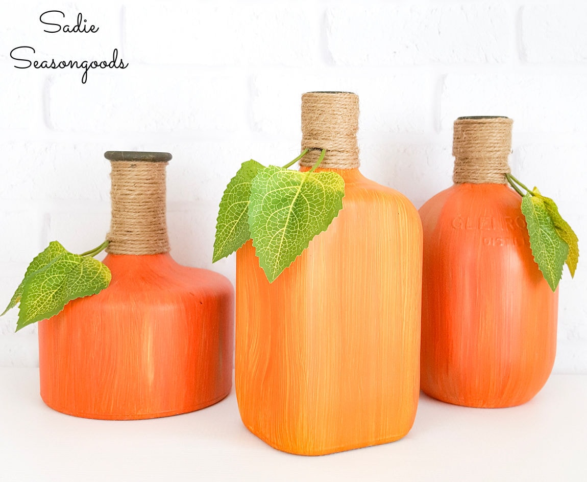 glass pumpkins by liquor bottle painting