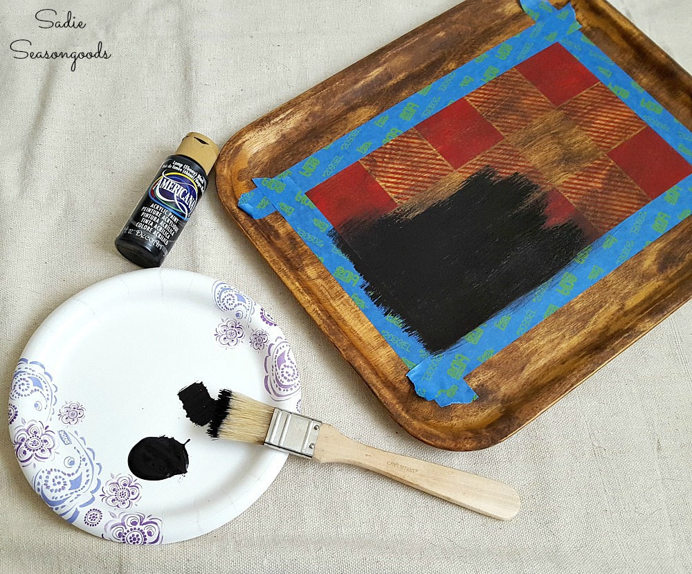 Painting over a Pinterest Fail with black craft paint to create the rustic cabin decor with a Buffalo plaid stencil