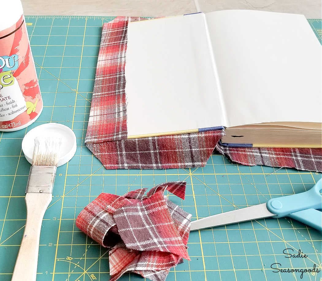 making the fabric book covers from thrift flannels