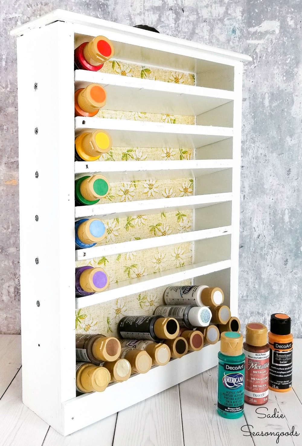 Acrylic paint storage rack in an old kitchen drawer