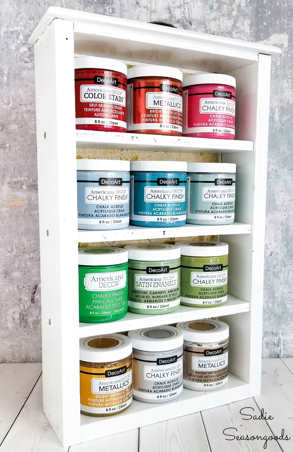 Craft room organization with an acrylic paint storage rack