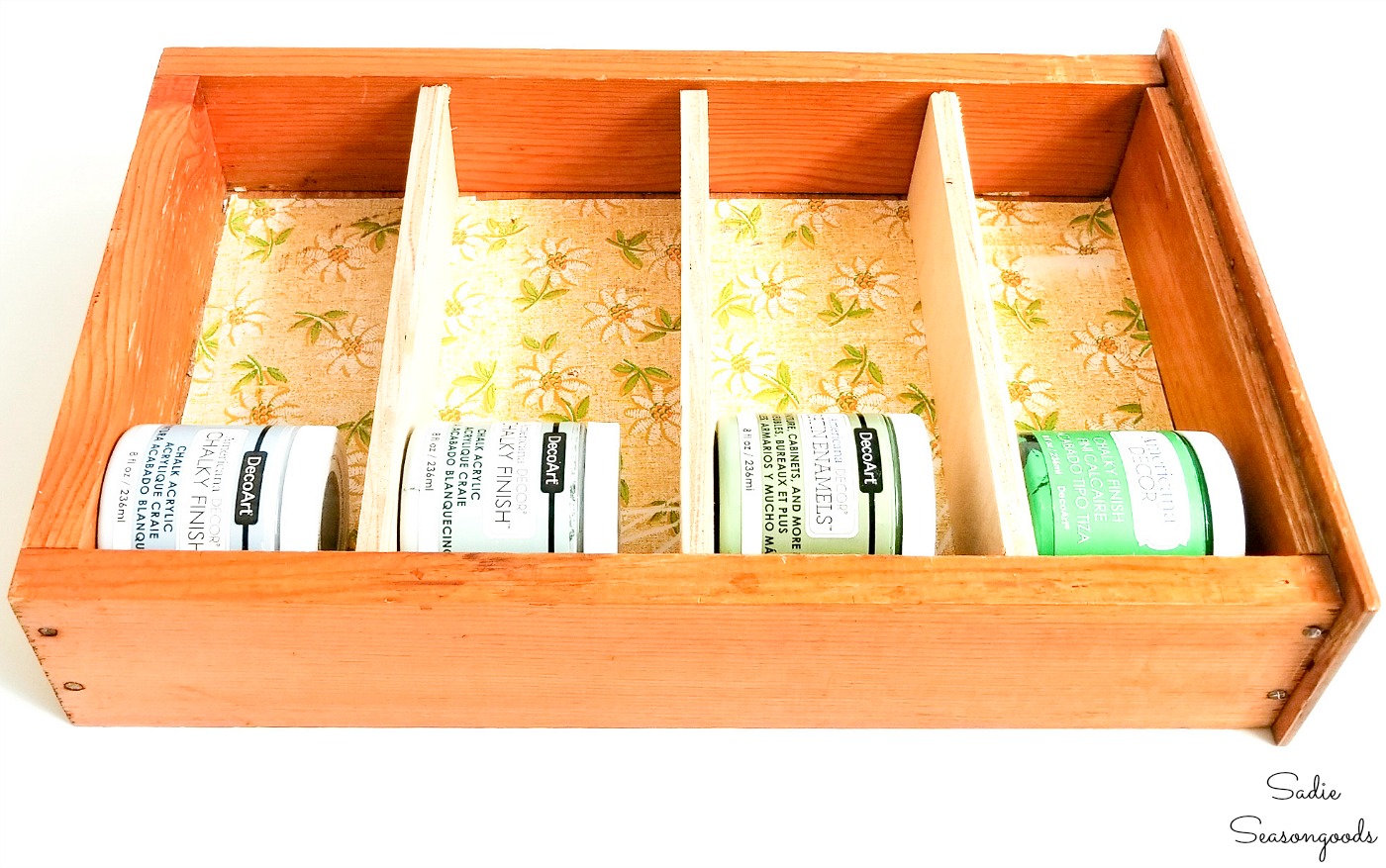 Upcycling the wooden drawers as craft paint storage