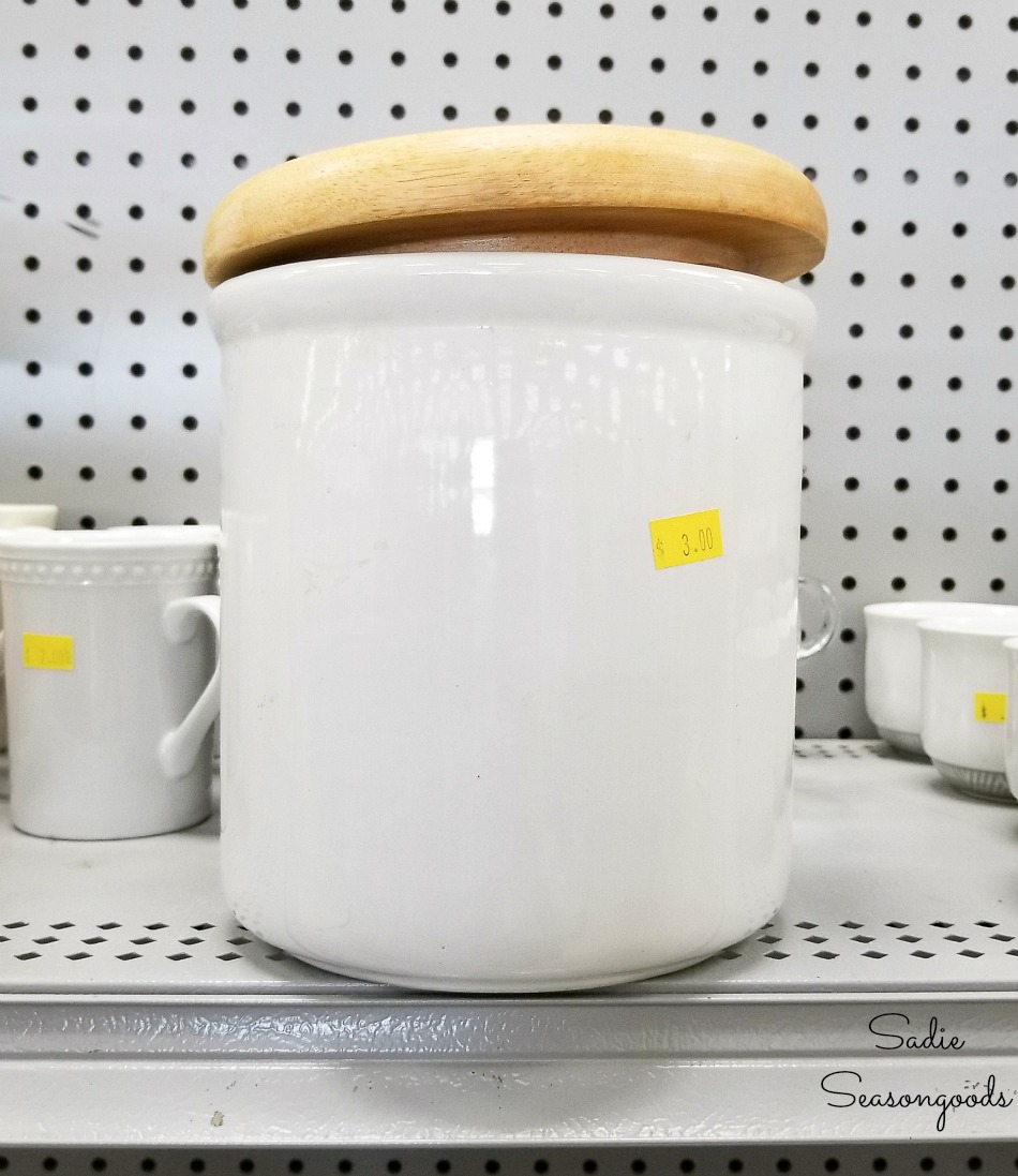 White ceramic canister at the thrift store for upcycling into the vintage crocks