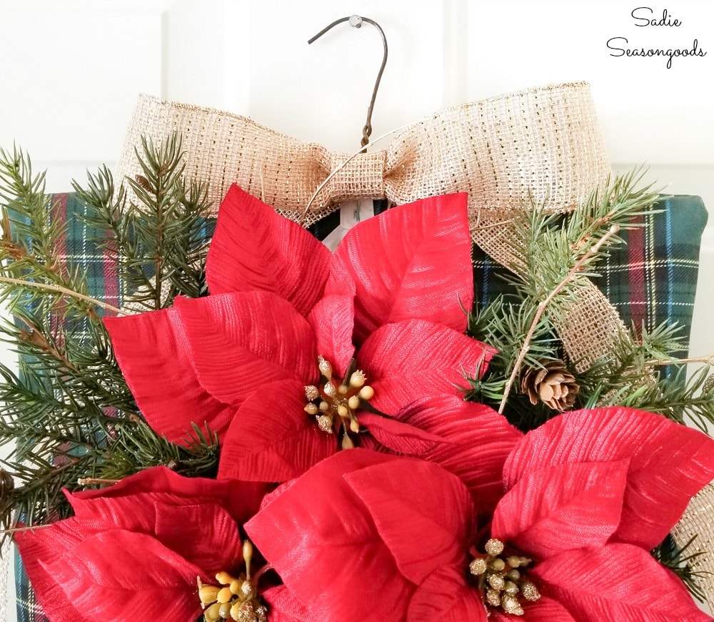 Burlap bow on a rustic Christmas wreath