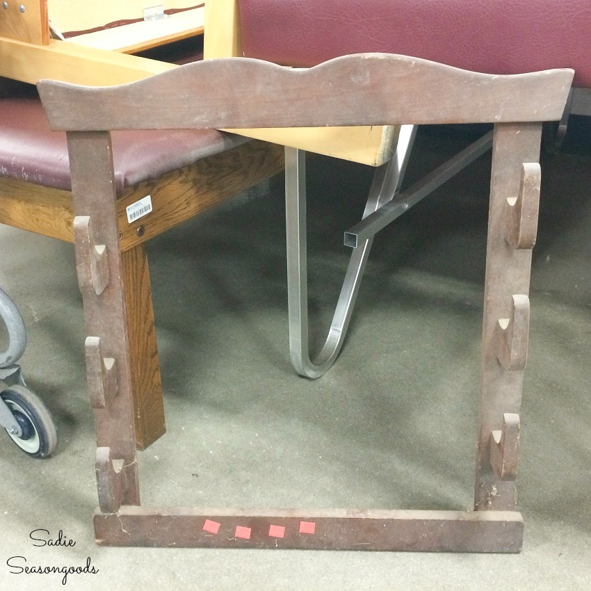 Hanging gun rack at a thrift store