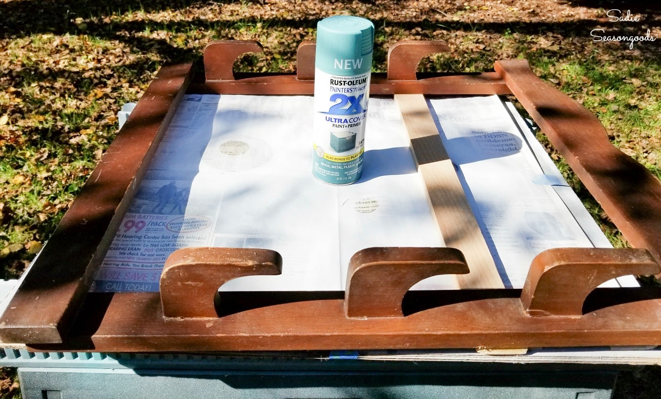 Spray painting a hanging gun rack Spray painting a hanging gun rack