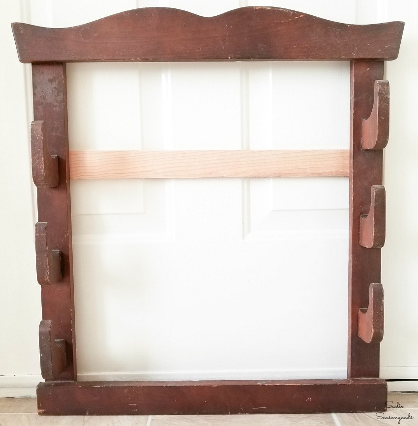 Upcycling a gun rack into entryway hooks