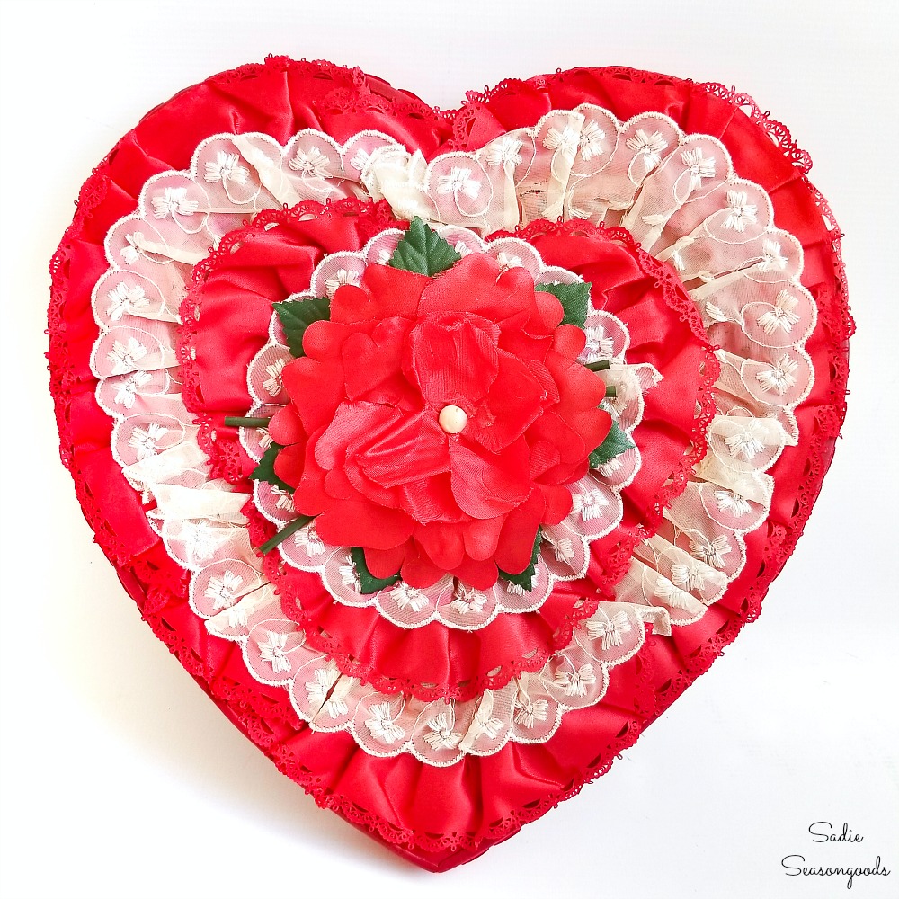 Valentine's Day home decor with a heart shaped chocolate box used as a heart wreath