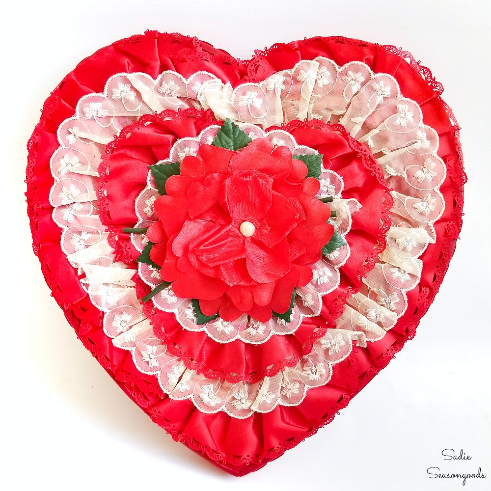 Valentine's Day home decor with a heart shaped chocolate box used as a heart wreath Valentine's Day home decor with a heart shaped chocolate box used as a heart wreath