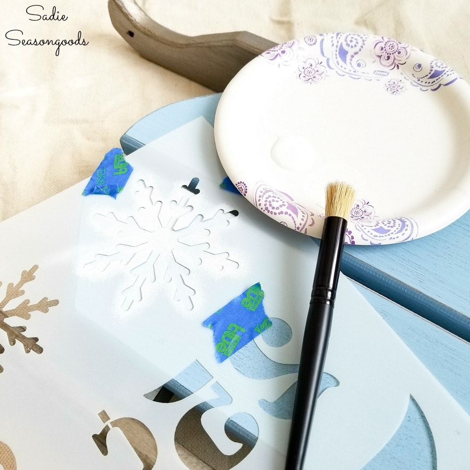 Snowflake stencil on wooden sled decor Snowflake stencil on wooden sled decor