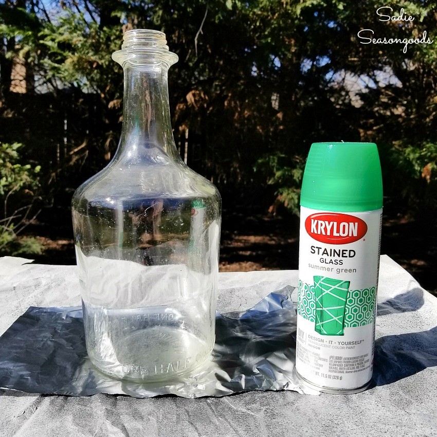 Stained glass spray paint on a demijohn bottle for glass bottle crafts