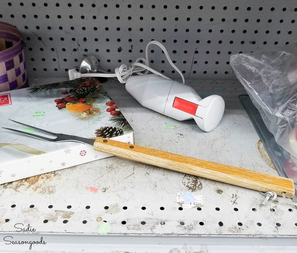 Grill fork at a thrift store for upcycling as a sign stake