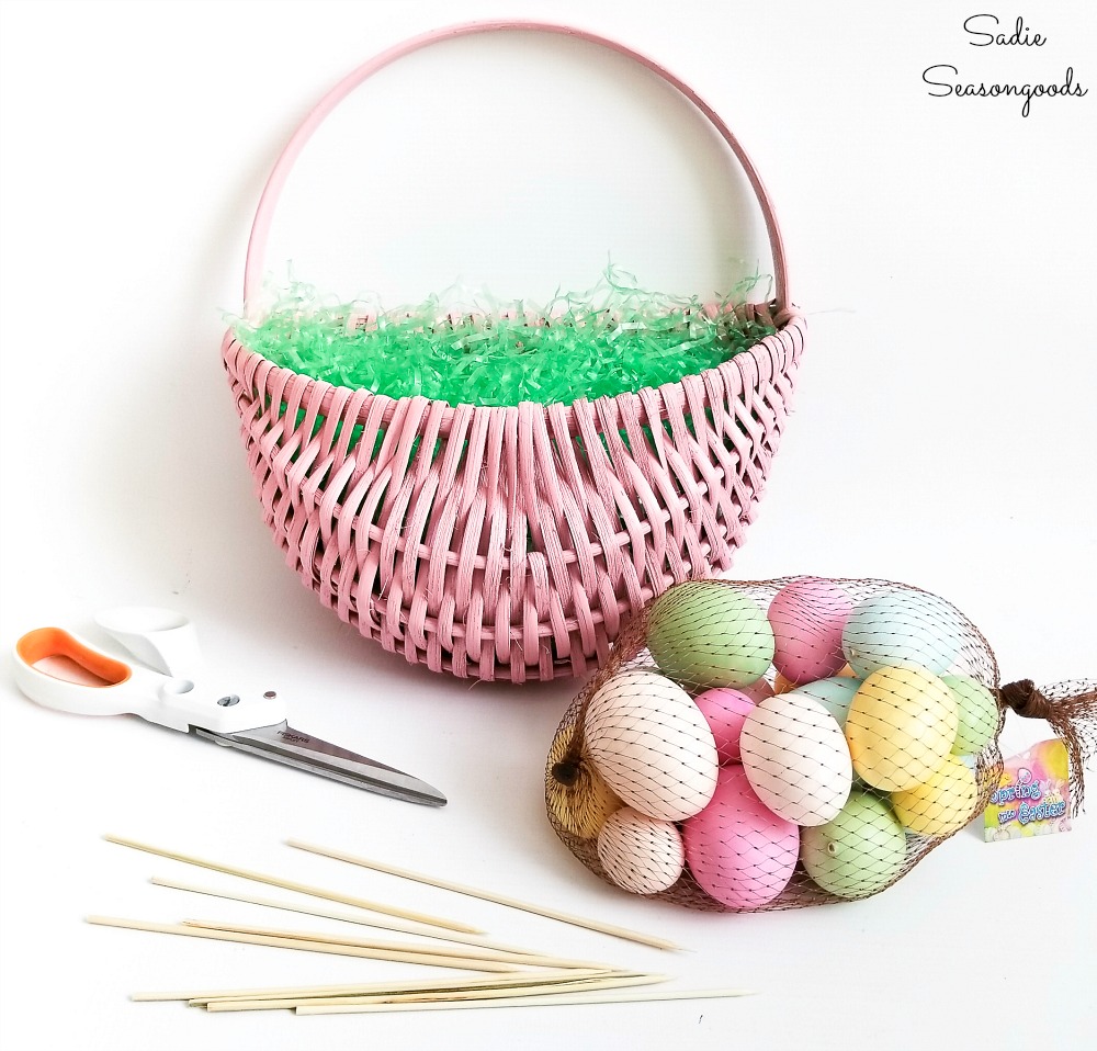 Transforming a hanging door basket into an Easter wreath with eggs and bamboo skewers