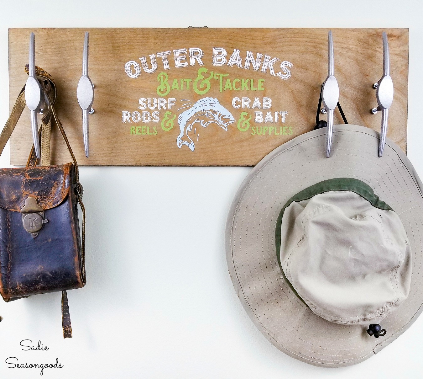 Upcycling the vintage drawer handles into boat cleats for nautical wall decor