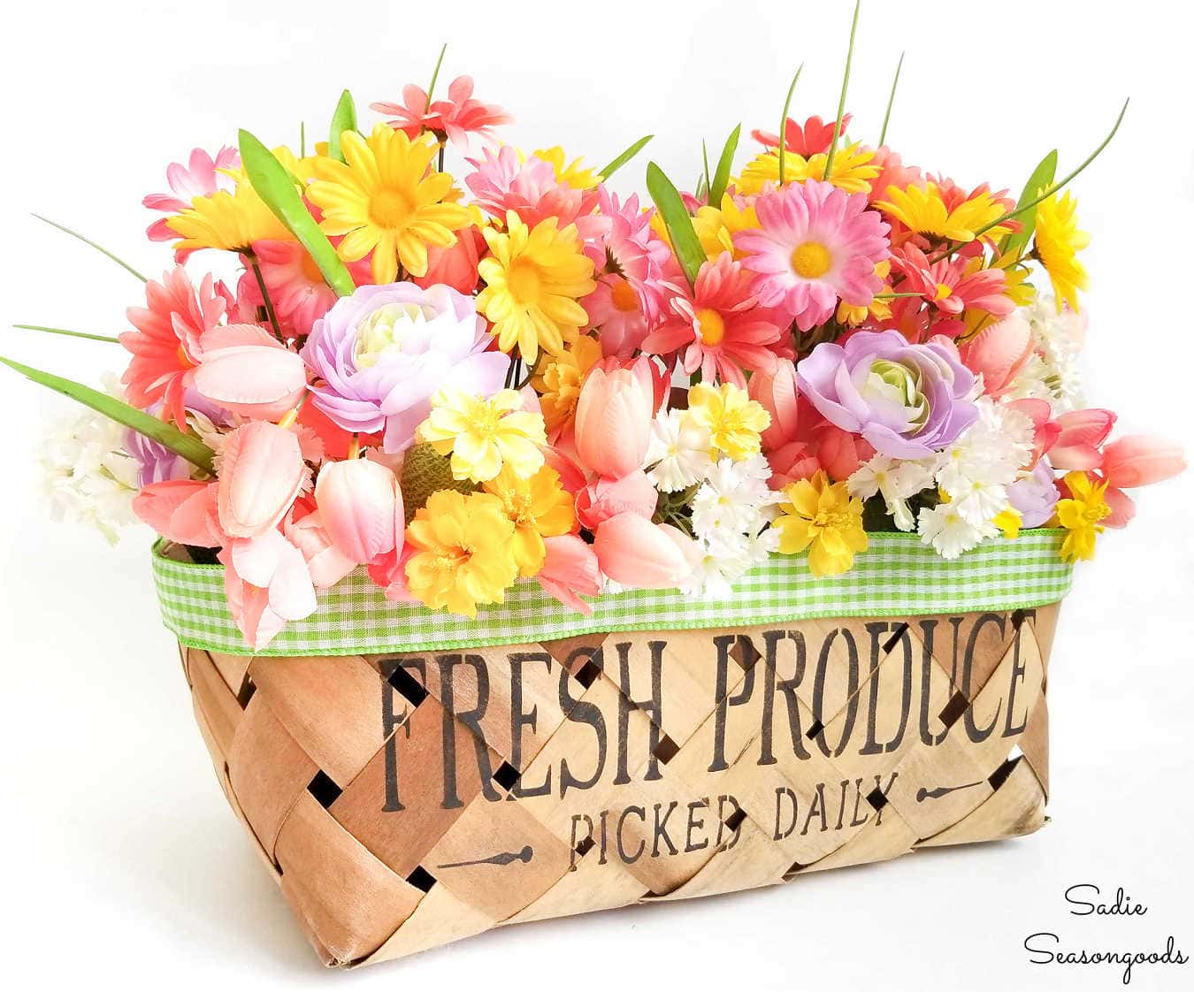 outdoor spring decorations in a peach basket
