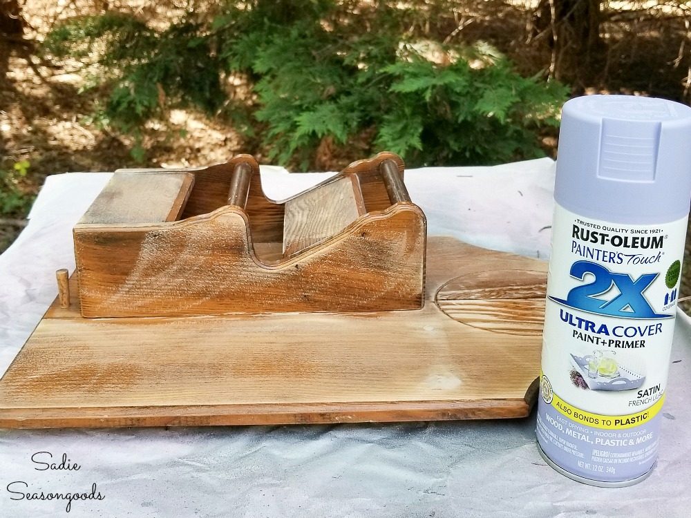 Spray painting a DIY jewelry hanger with French Lilac