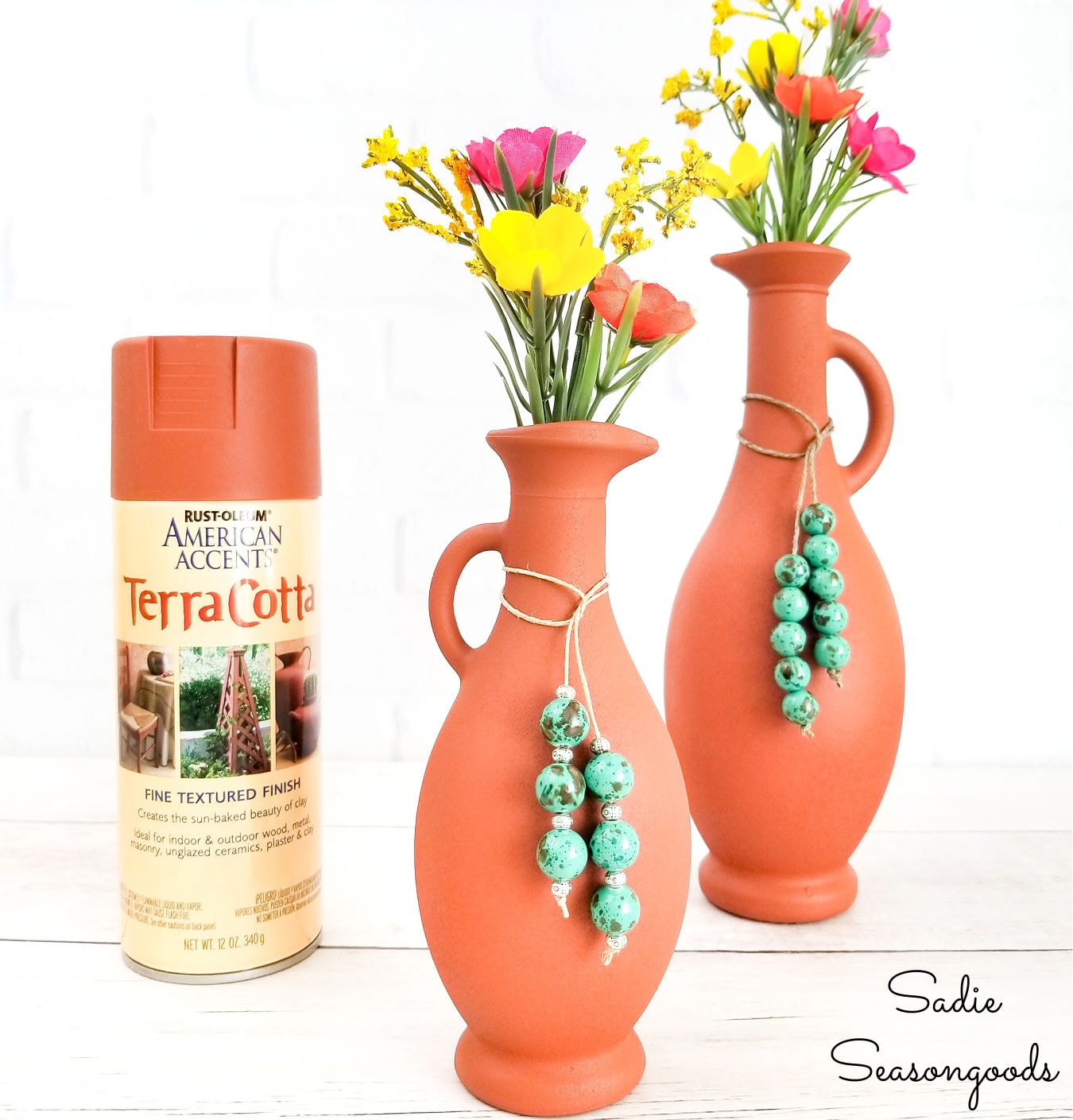 spray painting glass vases with terracotta spray paint