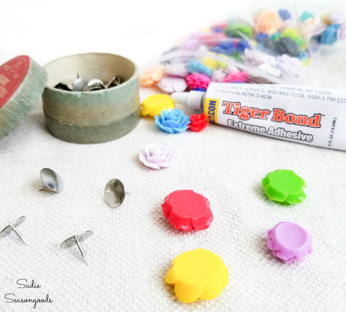 Making the decorative thumb tacks with resin flowers and non toxic glue