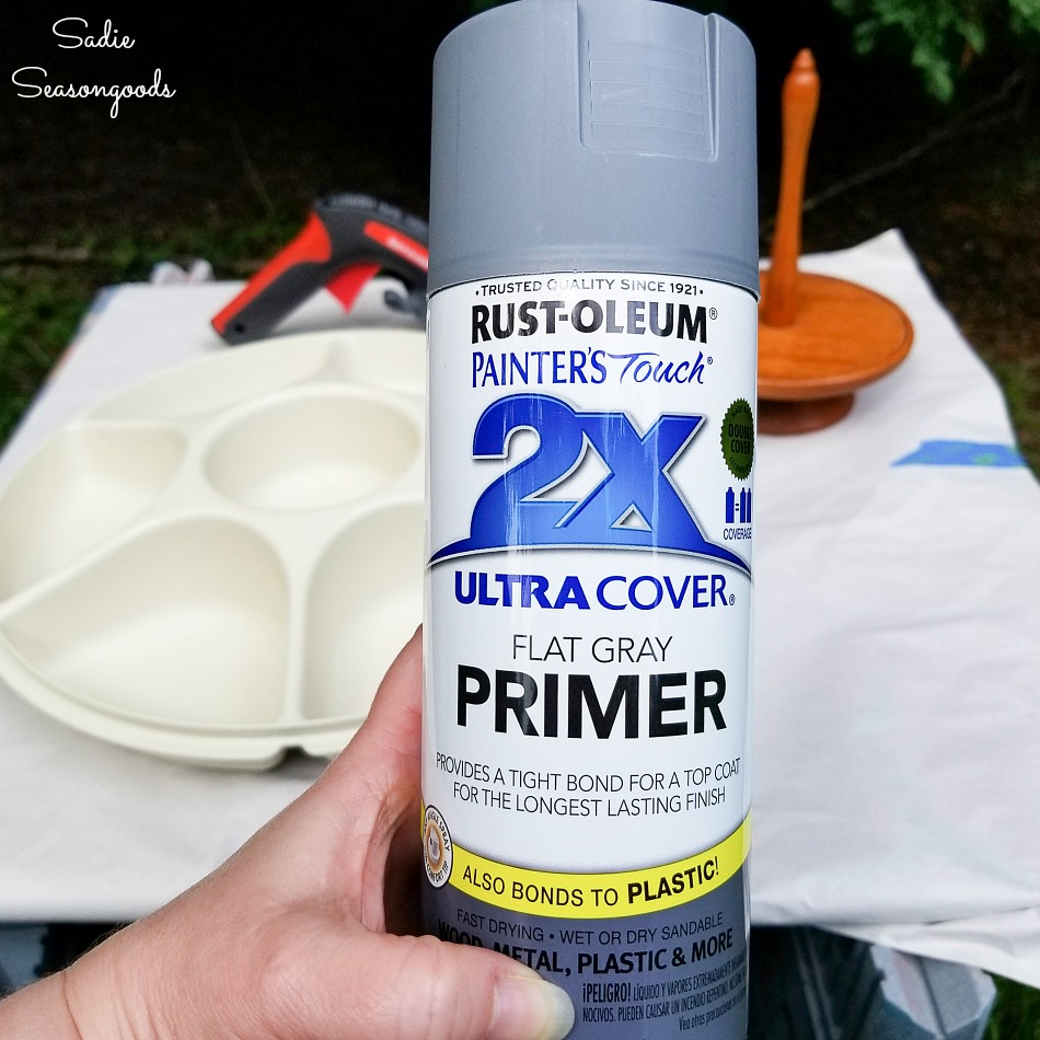 Spray primer on plastic before spray painting to look like galvanized steel