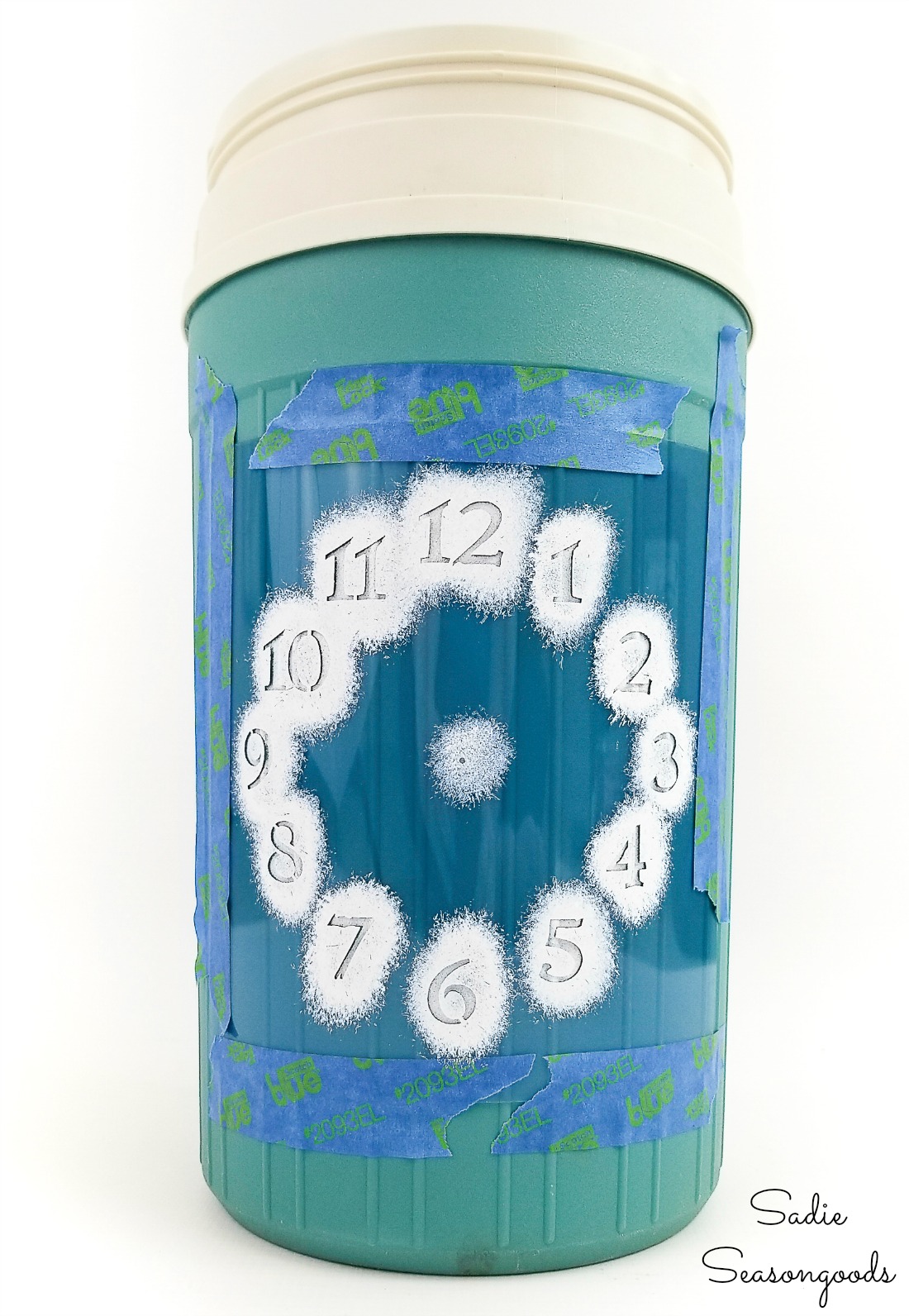 Happy hour decor with a clock stencil and a wine bottle cooler