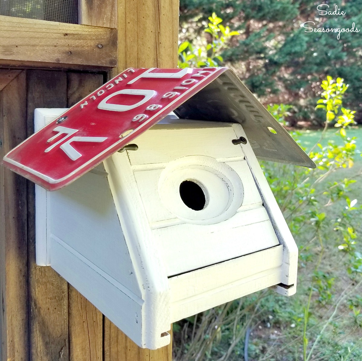 How to build a DIY bird house or chickadee bird house by upcycling a tissue box holder and license plate for the roof
