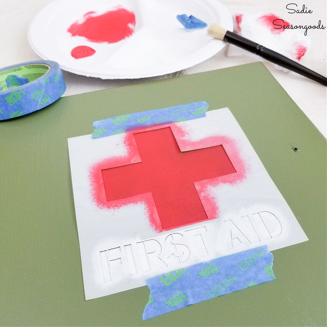 stenciling a first aid cabinet