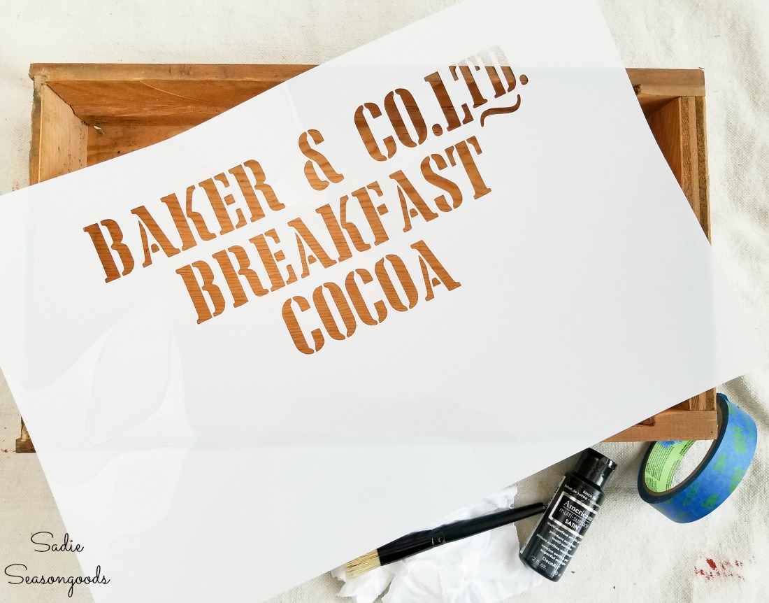 Stenciling an old drawer like a rustic wooden crate