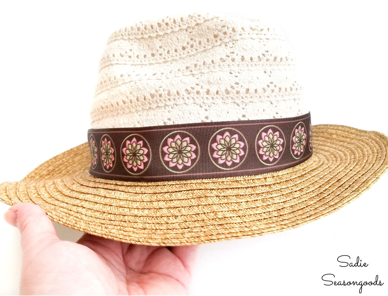 decorating a straw hat with a ribbon belt