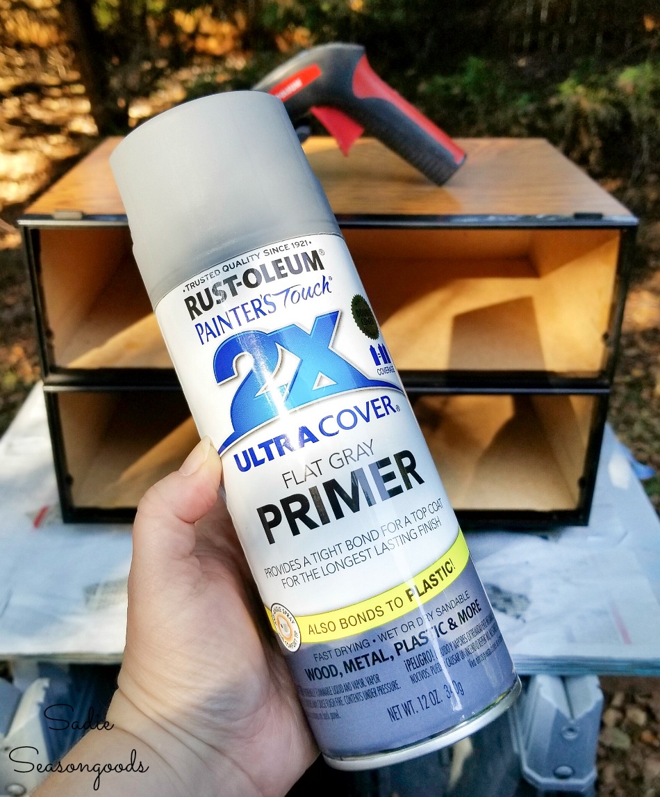 Spray primer before using metallic paint on VHS storage