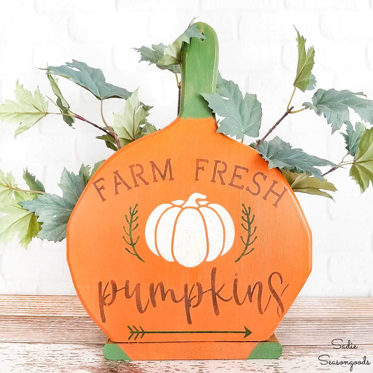 pumpkin patch sign on a wooden paper plate holder